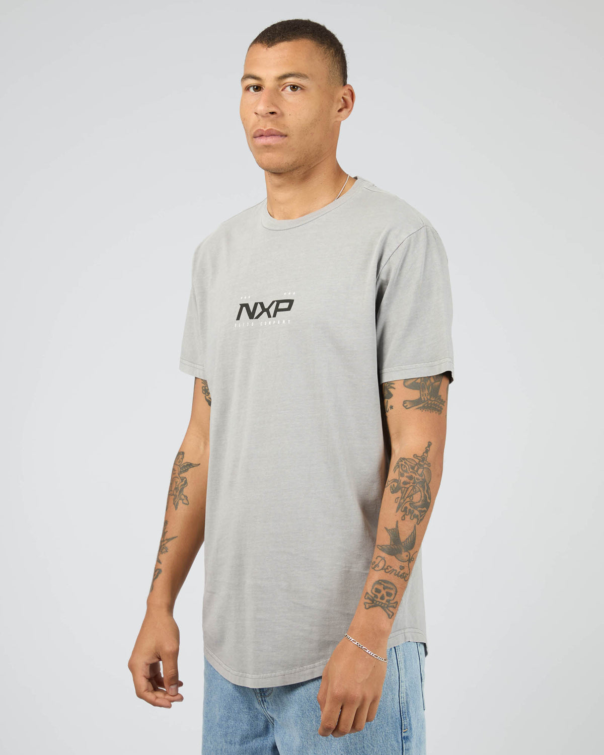 Deliberate Dual Curved Tee Alloy